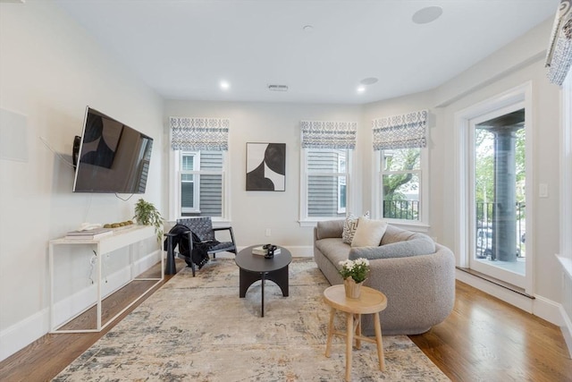 1650 Columbia Rd Unit 2, Boston, MA 02127 - living room featuring wood finished floors and recessed lighting