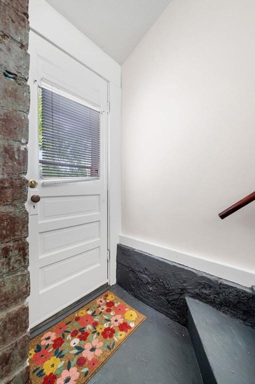 entryway with finished concrete floors