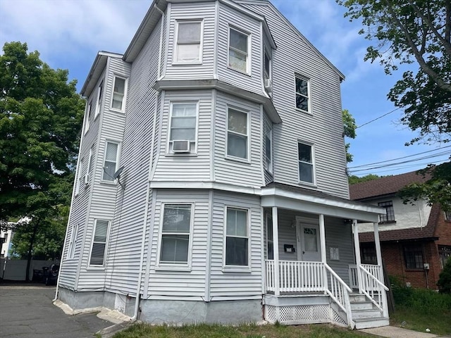 108 Grove St, Lynn, MA 01905 - view of front of house with covered porch and cooling unit