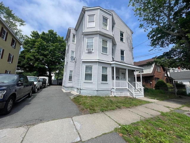 108 Grove St, Lynn, MA 01905 - townhome / multi-family property featuring a porch