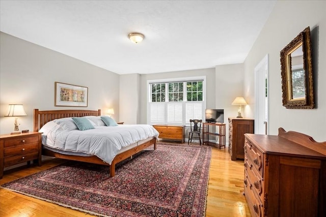 bedroom featuring light wood finished floors