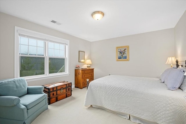 bedroom with carpet and visible vents