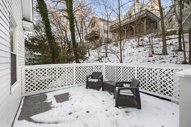 view of snow covered patio