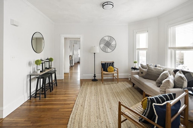 living room with ornamental molding and dark hardwood / wood-style floors