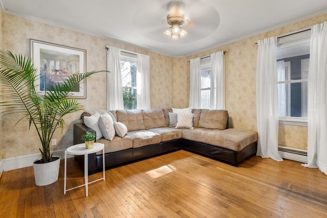 349 Pleasant St, Milton, MA 02186 - living area with ceiling fan, hardwood / wood-style flooring, ornamental molding, and a baseboard radiator