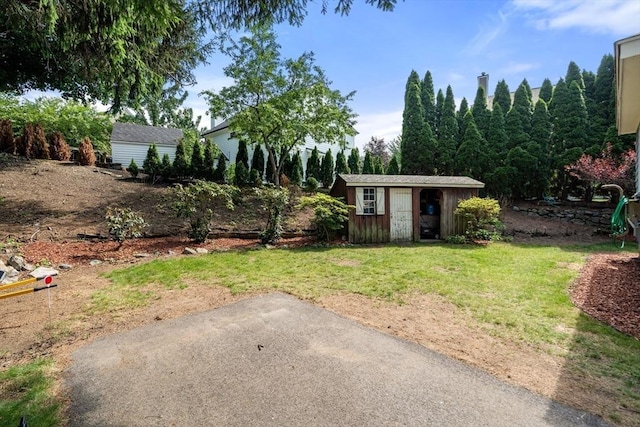 349 Pleasant St, Milton, MA 02186 - view of green lawn featuring a storage shed