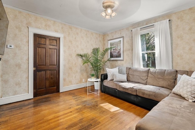 349 Pleasant St, Milton, MA 02186 - living room featuring wood finished floors, crown molding, and a ceiling fan