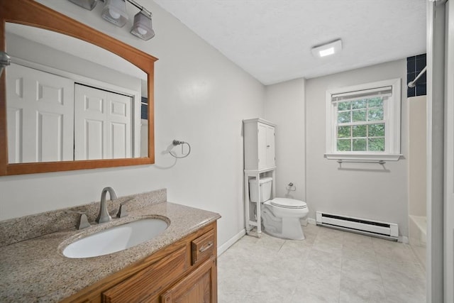 585 Turnpike St Unit 13, Easton, MA 02375 - bathroom with a baseboard heating unit, vanity, baseboards, toilet, and shower / tub combination