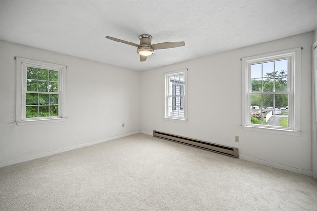 585 Turnpike St Unit 13, Easton, MA 02375 - carpeted empty room with a baseboard heating unit, a ceiling fan, and baseboards