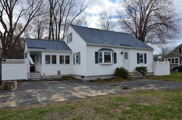 24 Dorothy Ave, Dracut, MA 01826 - new england style home with a shingled roof and driveway