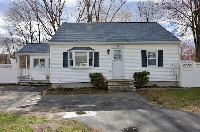 24 Dorothy Ave, Dracut, MA 01826 - cape cod house with a shingled roof and entry steps