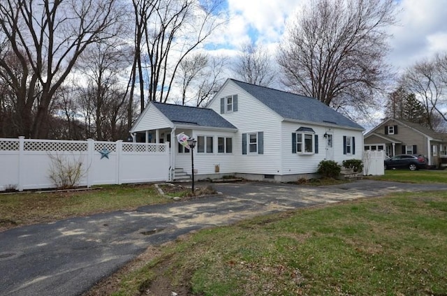 24 Dorothy Ave, Dracut, MA 01826 - view of front facade with driveway and roof with shingles