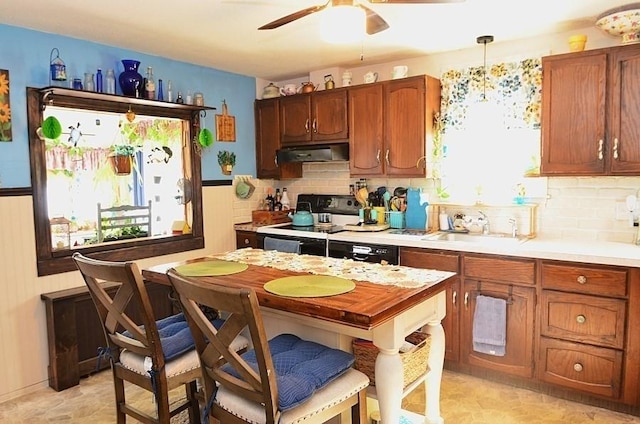 24 Dorothy Ave, Dracut, MA 01826 - kitchen with range hood, electric range oven, light countertops, ceiling fan, and decorative backsplash