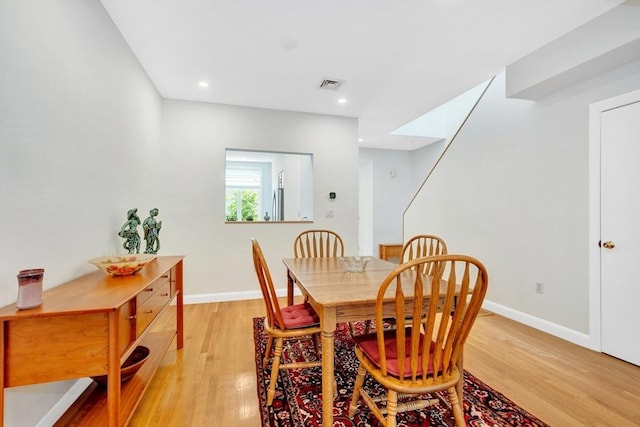 14 Michaels Grn Unit 14, Woburn, MA 01801 - dining area featuring light wood-style floors, baseboards, and recessed lighting