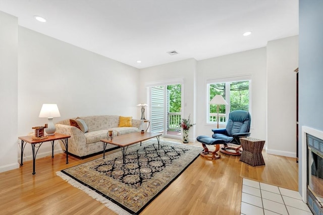 14 Michaels Grn Unit 14, Woburn, MA 01801 - living area featuring light wood finished floors, baseboards, and recessed lighting