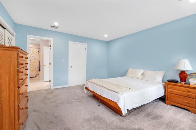 14 Michaels Grn Unit 14, Woburn, MA 01801 - carpeted bedroom featuring baseboards and connected bathroom