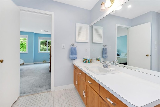 14 Michaels Grn Unit 14, Woburn, MA 01801 - bathroom featuring connected bathroom, vanity, and baseboards
