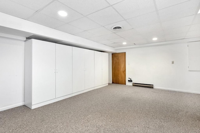 14 Michaels Grn Unit 14, Woburn, MA 01801 - finished below grade area with a baseboard heating unit, carpet flooring, recessed lighting, baseboards, and a drop ceiling