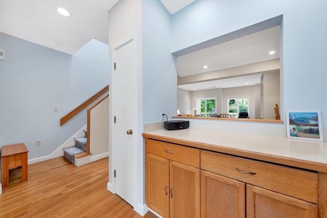 14 Michaels Grn Unit 14, Woburn, MA 01801 - bar featuring light wood-style flooring, stairway, recessed lighting, and baseboards