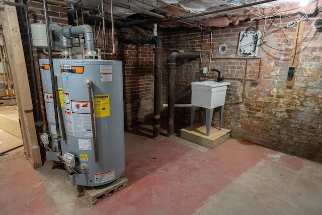 utility room with water heater