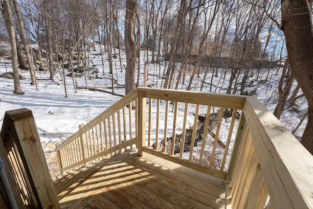 view of snow covered deck