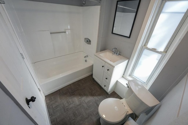 full bath featuring vanity, toilet, and shower / bathtub combination