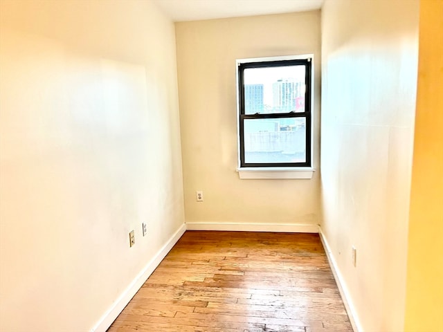 empty room featuring light hardwood / wood-style floors