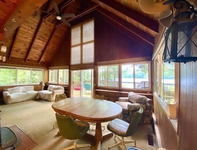 64E Old Princeton Rd, Hubbardston, MA 01452 - sunroom / solarium with a wooden ceiling with exposed beams, plenty of natural light, carpet flooring, and high vaulted ceiling