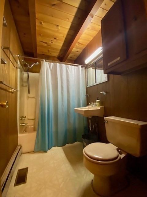 64E Old Princeton Rd, Hubbardston, MA 01452 - bathroom featuring a wood ceiling with exposed beams, baseboard heating, shower / bath combo, and tile patterned floors