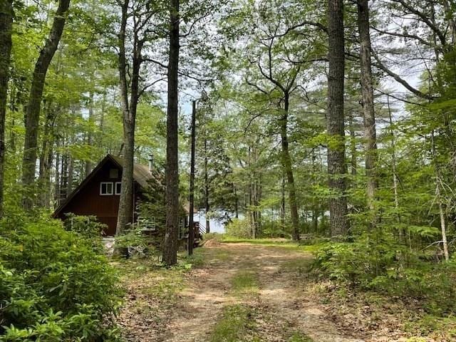 64E Old Princeton Rd, Hubbardston, MA 01452 - view of property exterior with a barn and a forest view