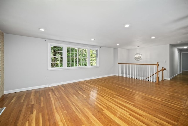 34 Clubhouse Ln, Natick, MA 01760 - empty room featuring a chandelier, light wood-style flooring, and recessed lighting