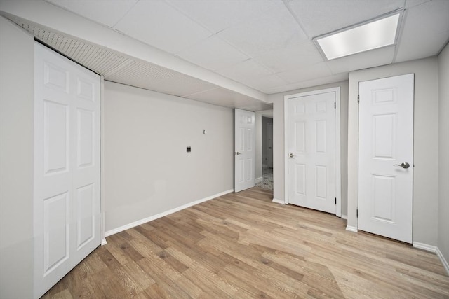 34 Clubhouse Ln, Natick, MA 01760 - finished below grade area featuring light wood-style flooring and baseboards