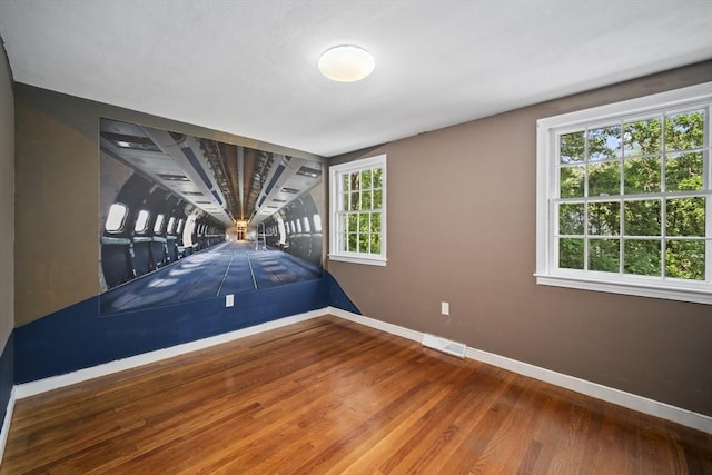 34 Clubhouse Ln, Natick, MA 01760 - spare room featuring baseboards and wood finished floors