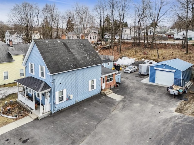 birds eye view of property with a residential view