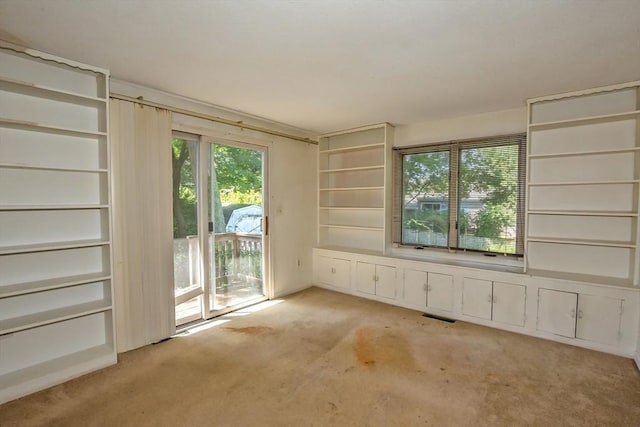 112 Harmon Ave, Springfield, MA 01118 - carpeted empty room featuring plenty of natural light