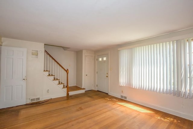 112 Harmon Ave, Springfield, MA 01118 - foyer featuring stairs, plenty of natural light, and light wood-style flooring