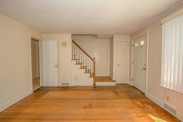 112 Harmon Ave, Springfield, MA 01118 - foyer entrance with light wood finished floors and stairs