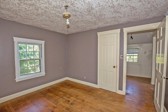 112 Harmon Ave, Springfield, MA 01118 - empty room featuring wood finished floors and baseboards