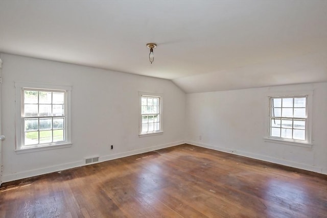 112 Harmon Ave, Springfield, MA 01118 - spare room with lofted ceiling and dark wood finished floors