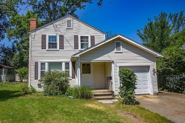 112 Harmon Ave, Springfield, MA 01118 - view of front of property featuring a chimney, a front lawn, driveway, and an attached garage