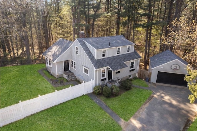 aerial view of property and surrounding area with a heavily wooded area