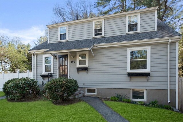 view of front of home featuring a shingled roof
