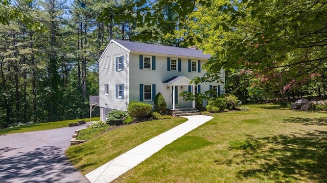 31 Battles Rd, Westminster, MA 01473 - colonial house with a front yard and a chimney