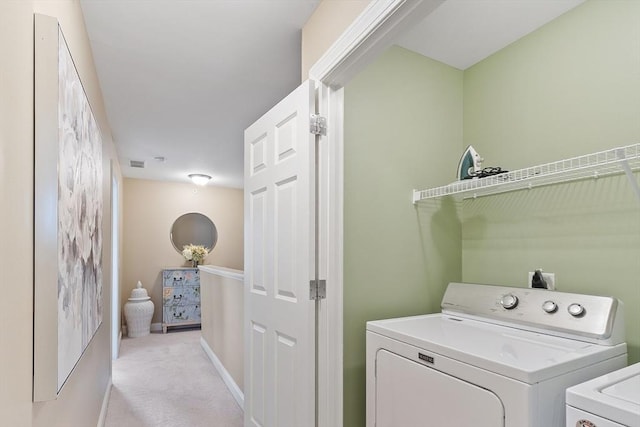 15 Coates Ln Unit 15, Haverhill, MA 01835 - washroom featuring washing machine and dryer, light colored carpet, and baseboards