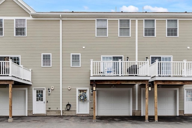 15 Coates Ln Unit 15, Haverhill, MA 01835 - rear view of house with an attached garage and a balcony