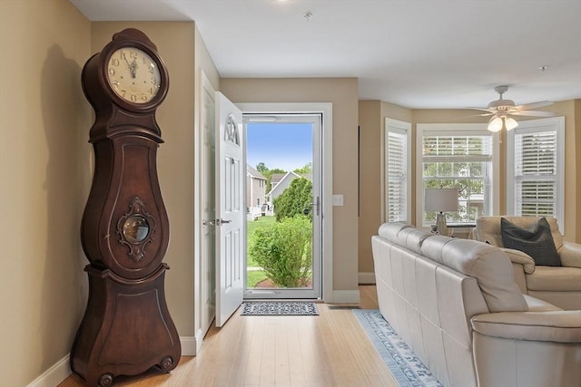 15 Coates Ln Unit 15, Haverhill, MA 01835 - foyer with light wood-style floors, baseboards, and ceiling fan