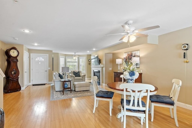 15 Coates Ln Unit 15, Haverhill, MA 01835 - dining space with ceiling fan, a fireplace, baseboards, light wood finished floors, and recessed lighting