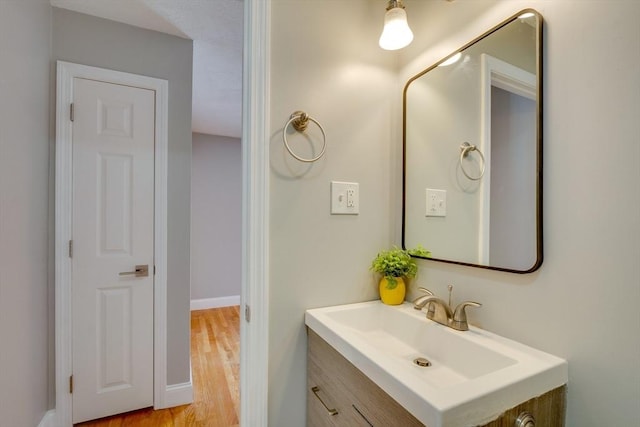 7 Mortimer Pl Unit 6, Somerville, MA 02145 - bathroom with vanity and wood finished floors
