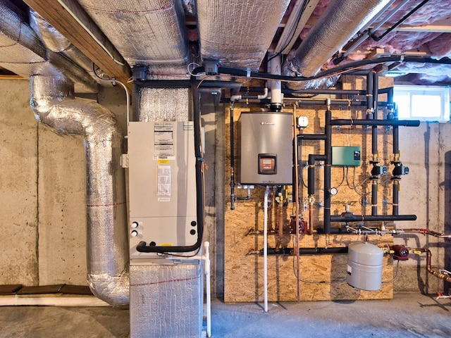 utility room with water heater