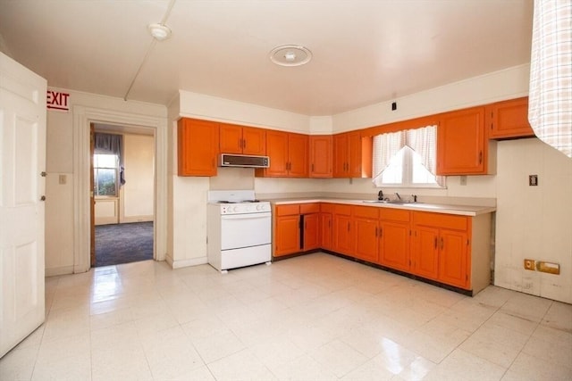 kitchen featuring sink, white range, and range hood